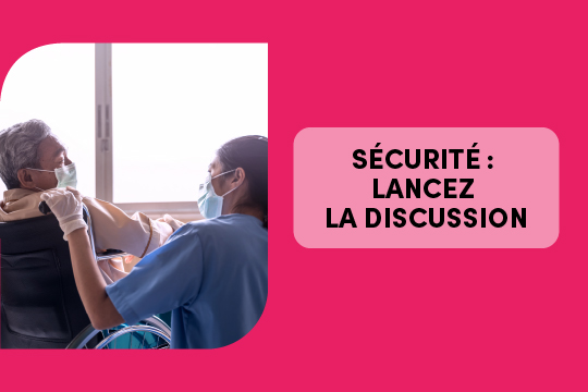 Prestataire de soins de santé et patient/résident en fauteuil roulant qui discutent de sécurité)