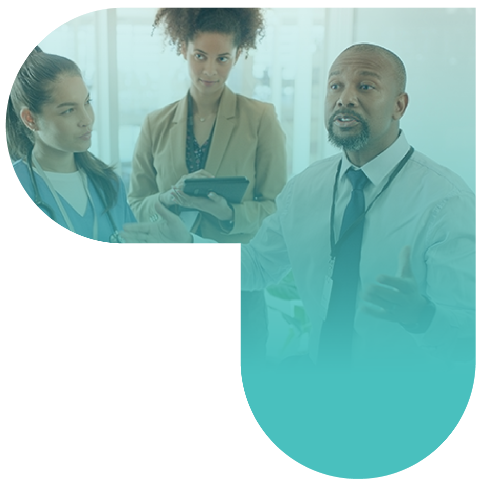 Three individuals having a discussion in a meeting room.