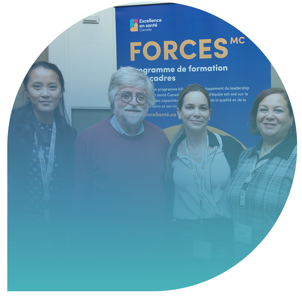 Group photo of participants at an HEC EXTRA workshop, standing together with a program banner in the background.