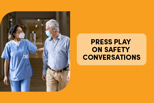 healthcare provider and patient/resident walking and having a safety conversation